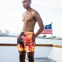 SPRAYGROUND® SWIM CAMO FIRE SHOTO SWIM TRUNKS