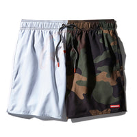 SPRAYGROUND® SWIM SPLIT BITE CAMO SHOTO SWIM TRUNKS