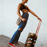 SPRAYGROUND® LUGGAGE SHARKFLOWER 21.5” CARRY-ON SHARKNAUTICS LUGGAGE