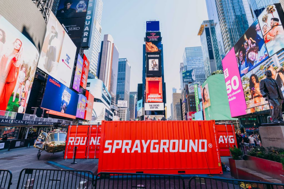 Sprayground Takes Over Times Square with a Gold Shark Chopper Pop-Up