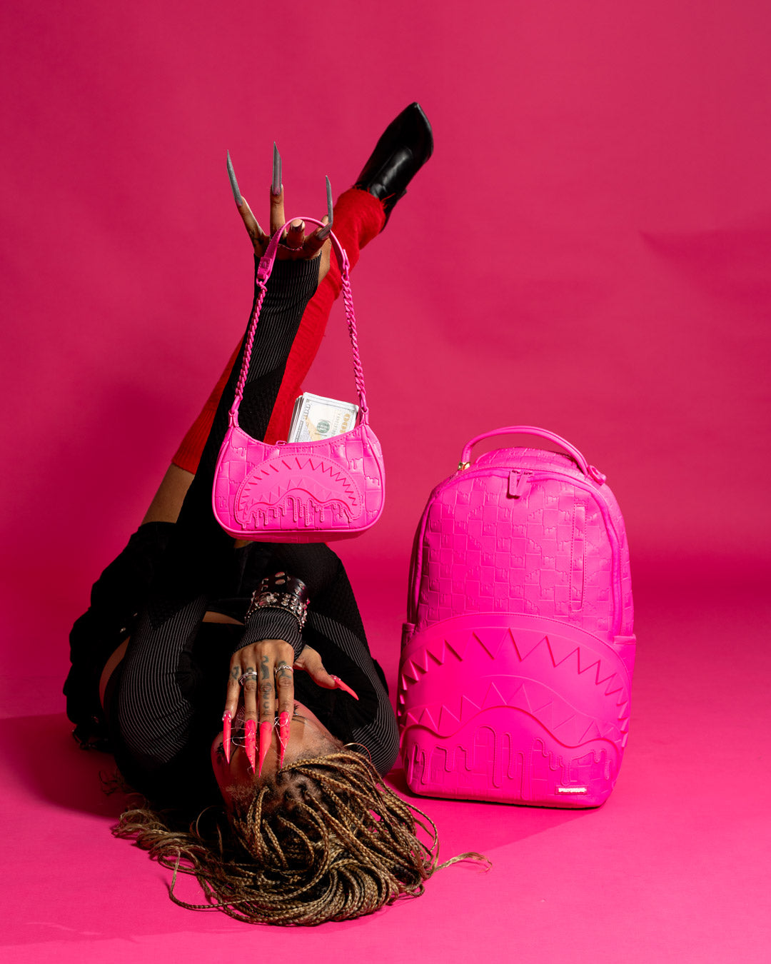 SPRAYGROUND® BACKPACK EMBOSS PINK DRIP CHECK BACKPACK