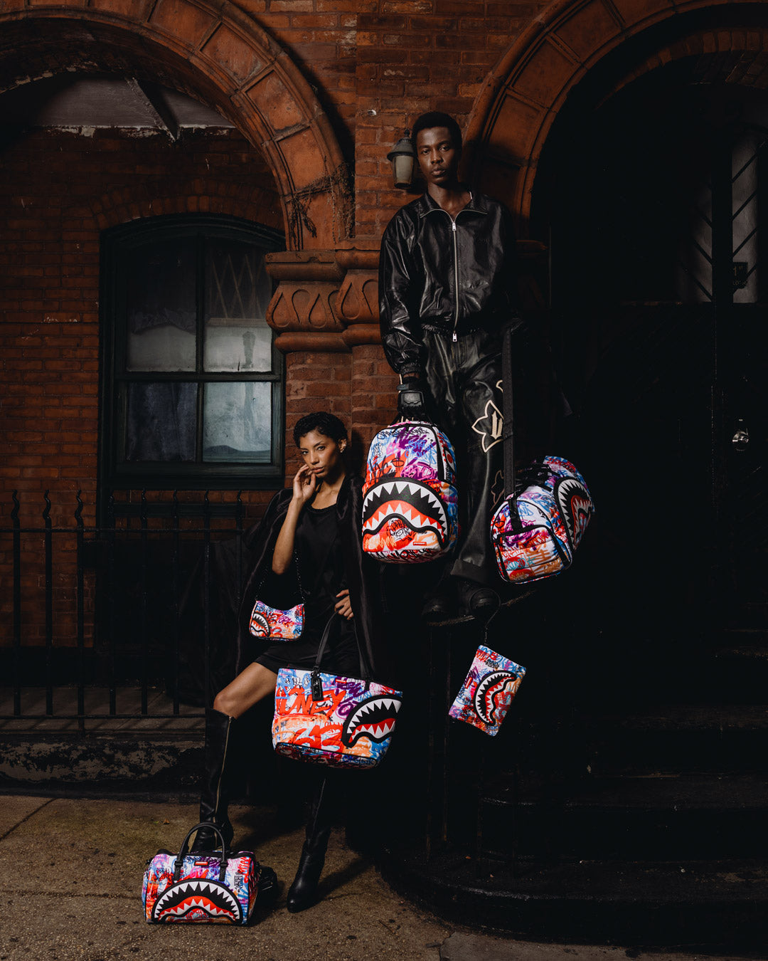 SPRAYGROUND® POUCHETTE TAGGED UP PUFFER CROSSOVER CLUTCH