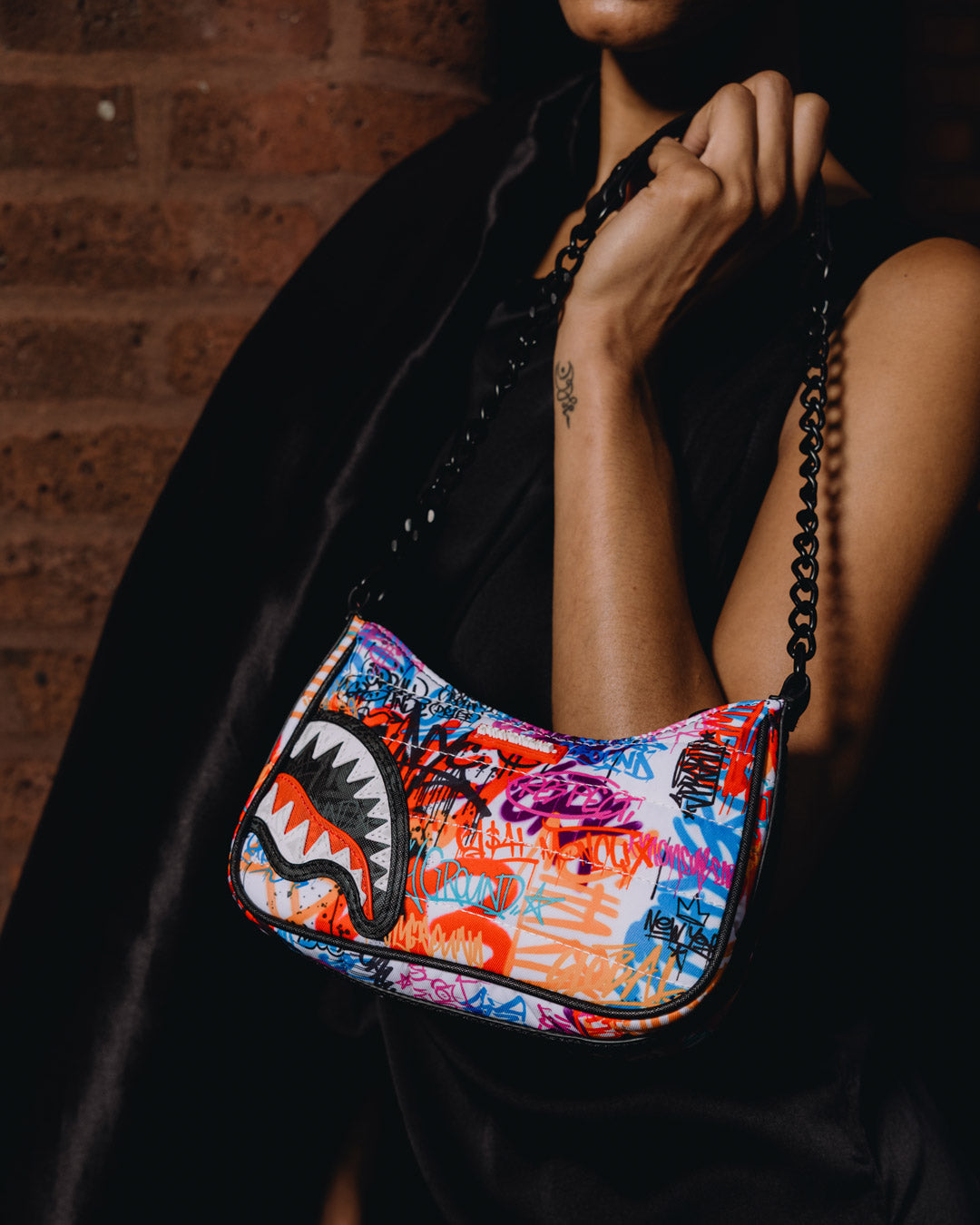 SPRAYGROUND® HANDBAG TAGGED UP PUFFER HANDBAG