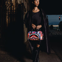 SPRAYGROUND® MINI DUFFLE TAGGED UP PUFFER MINI DUFFLE