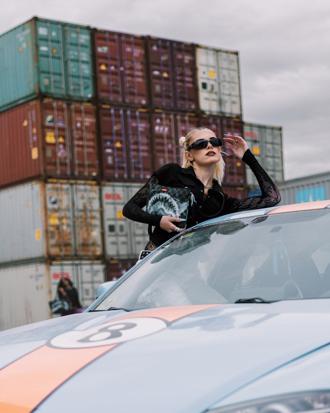 SPRAYGROUND® POUCHETTE SIP N SMOKE CROSSOVER CLUTCH