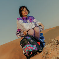 SPRAYGROUND® BACKPACK PURPLE SLIME TAKEOVER SAVAGE BACKPACK