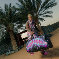 SPRAYGROUND® DUFFLE PURPLE SLIME TAKEOVER DUFFLE