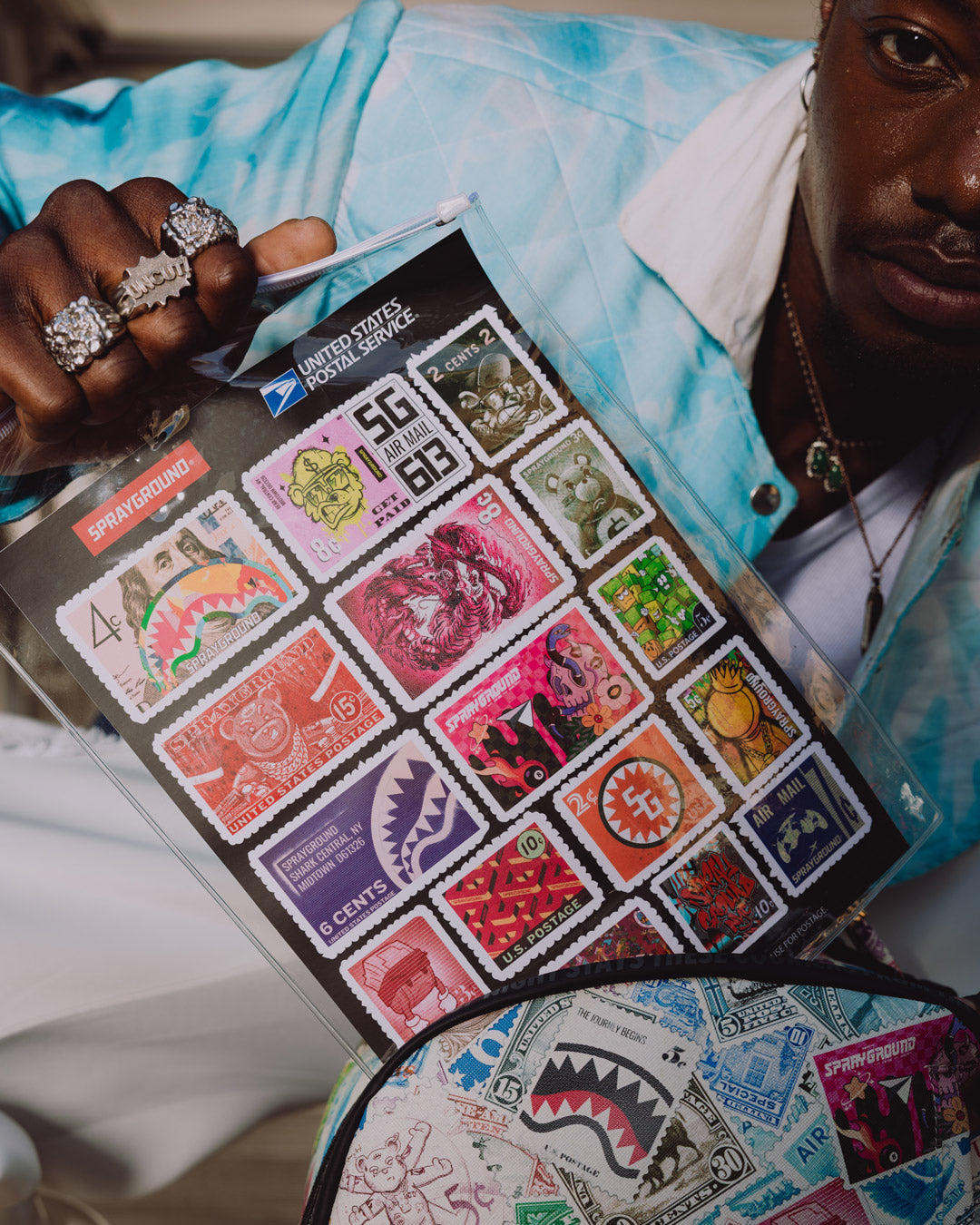 SPRAYGROUND® BACKPACK USPS STAMP STAMPEDE BACKPACK