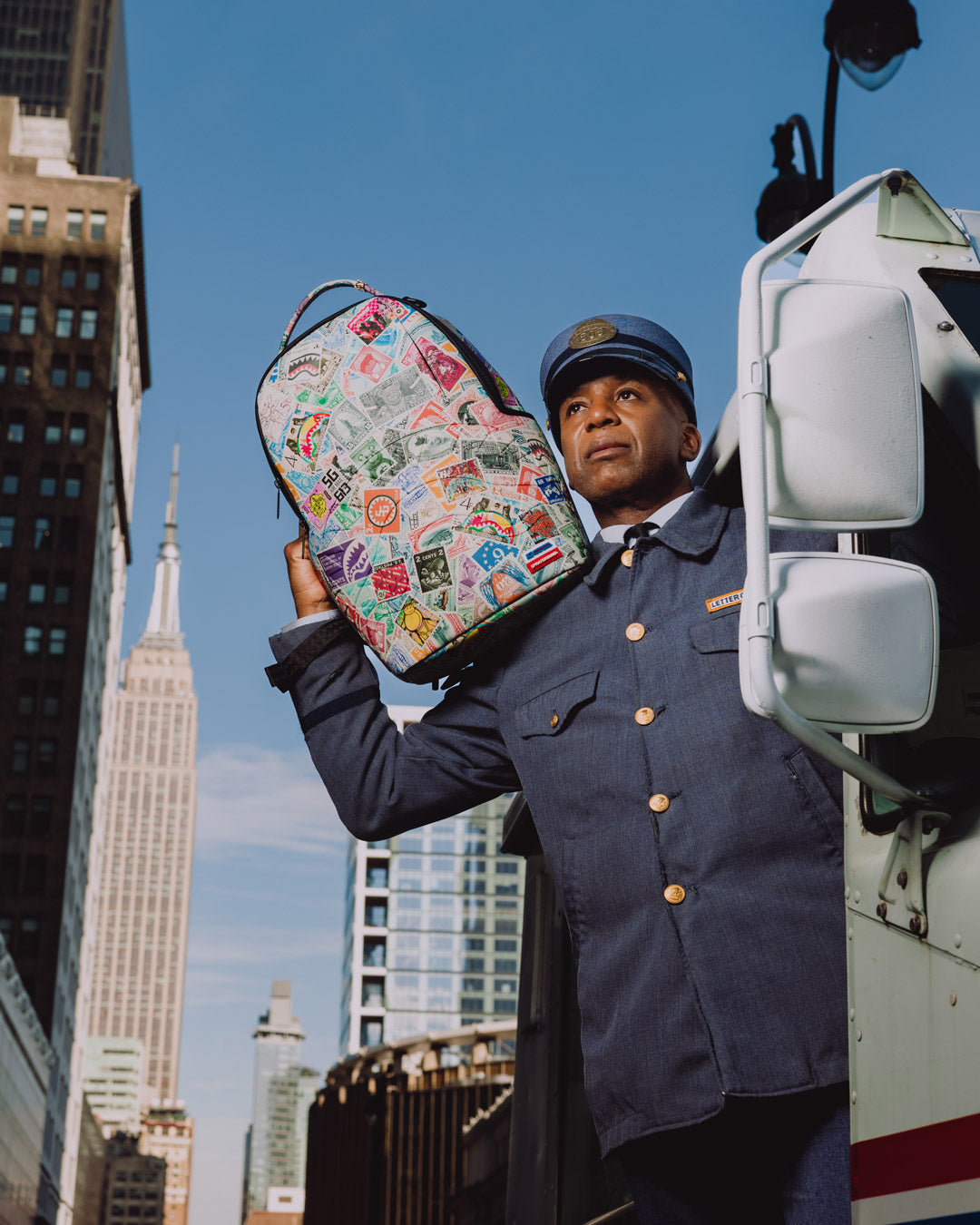 SPRAYGROUND® BACKPACK USPS STAMP STAMPEDE BACKPACK