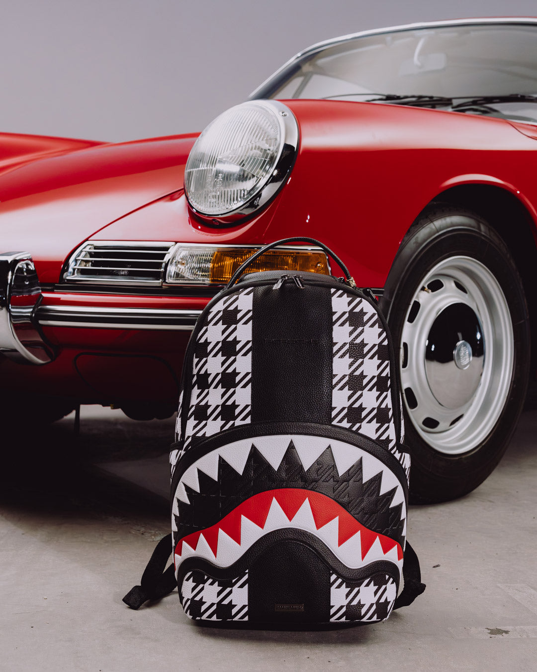 SPRAYGROUND® BACKPACK PORSCHE PEPITA STRIPE COLLAB BACKPACK - LIMITED EDITION