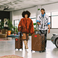SPRAYGROUND® LUGGAGE RED REDEMPTION CARRY-ON LUGGAGE