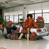 SPRAYGROUND® LUGGAGE RED REDEMPTION CARRY-ON LUGGAGE