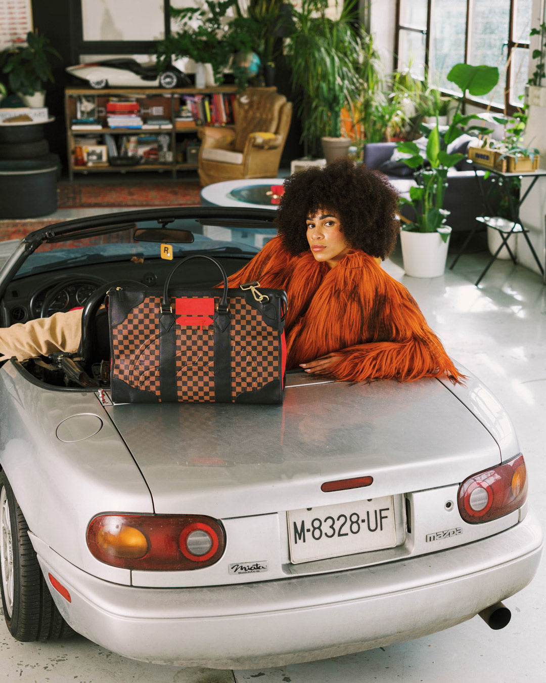 SPRAYGROUND® DUFFLE RED REDEMPTION PYRAMID DUFFLE