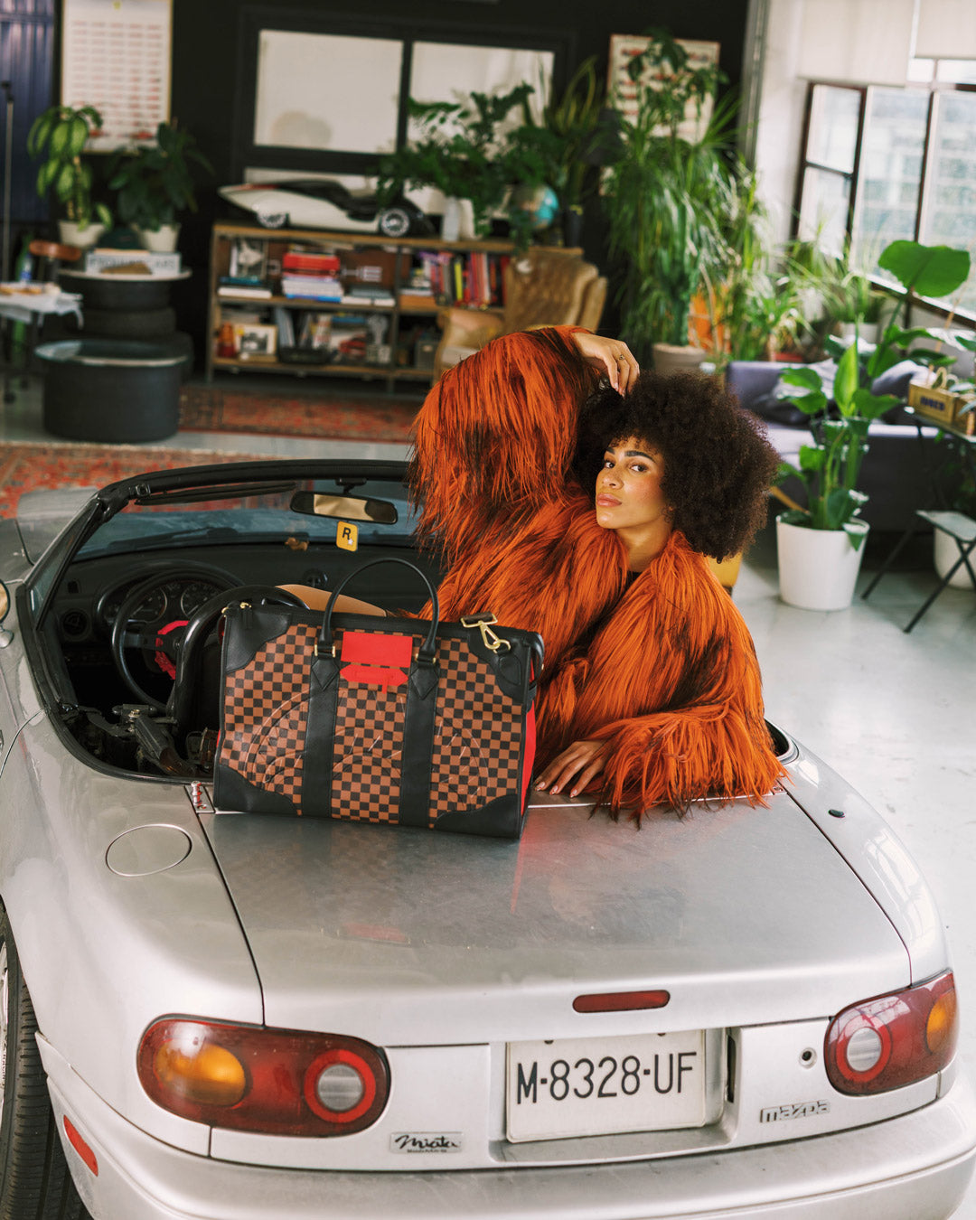 SPRAYGROUND® DUFFLE RED REDEMPTION PYRAMID DUFFLE