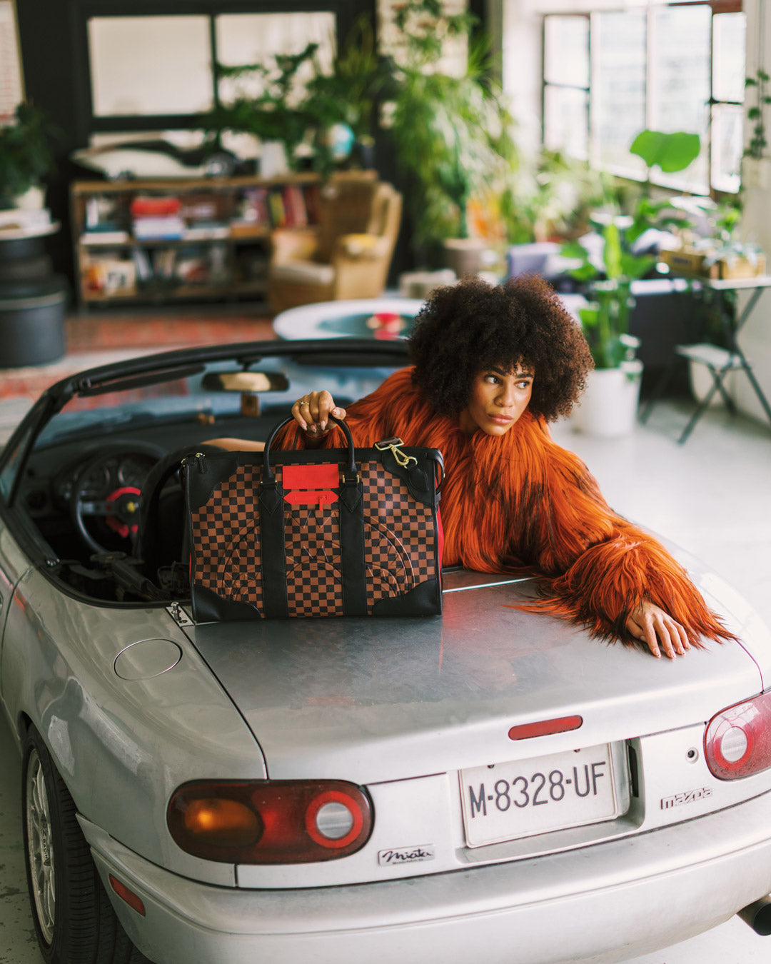 SPRAYGROUND® DUFFLE RED REDEMPTION PYRAMID DUFFLE