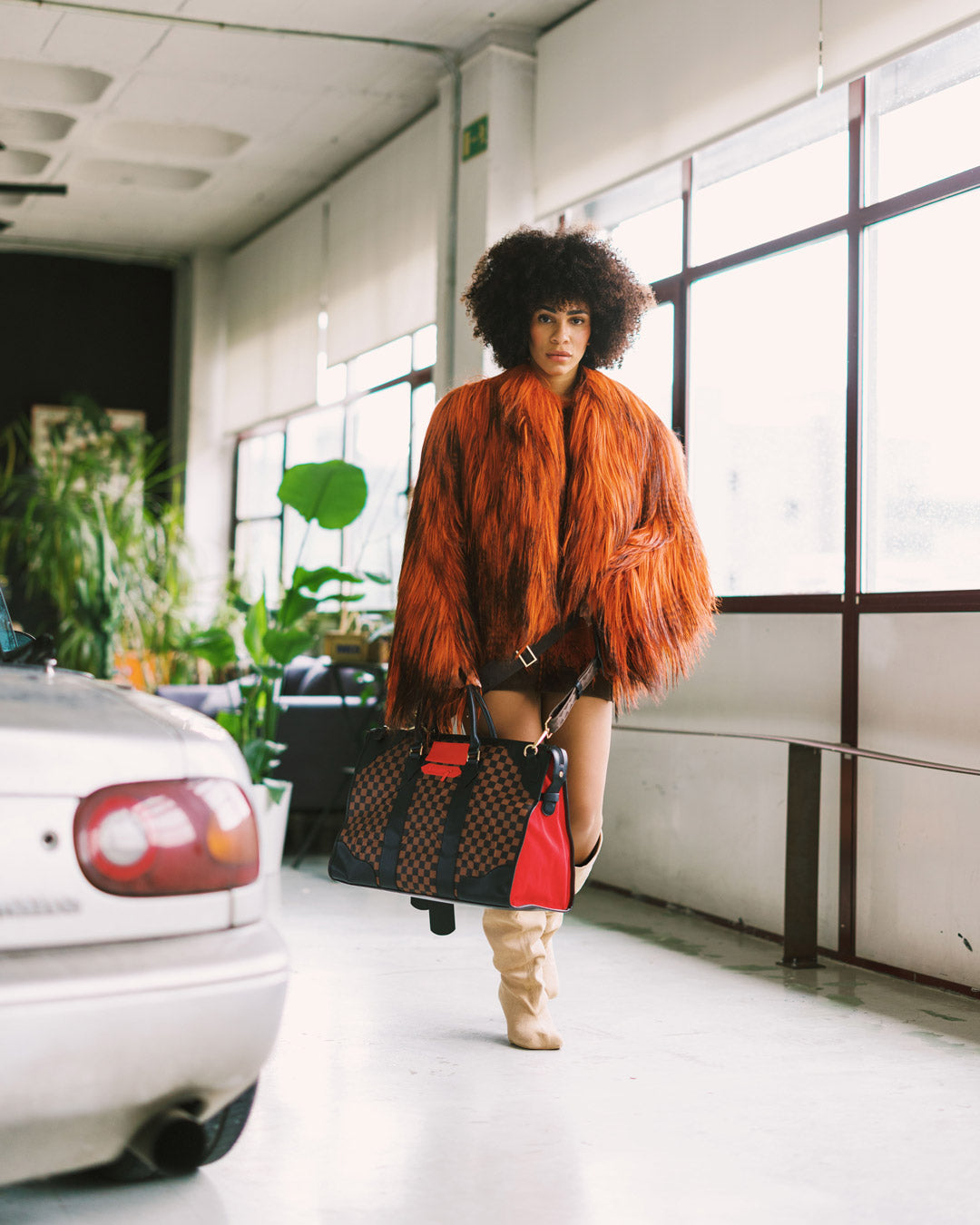 SPRAYGROUND® DUFFLE RED REDEMPTION PYRAMID DUFFLE