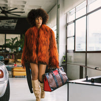 SPRAYGROUND® DUFFLE RED REDEMPTION PYRAMID DUFFLE