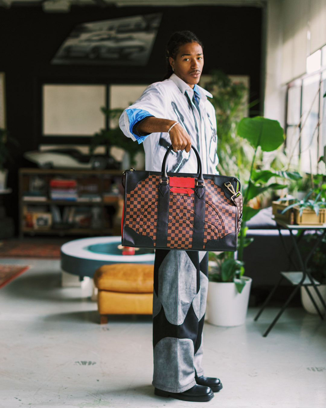 SPRAYGROUND® DUFFLE RED REDEMPTION PYRAMID DUFFLE