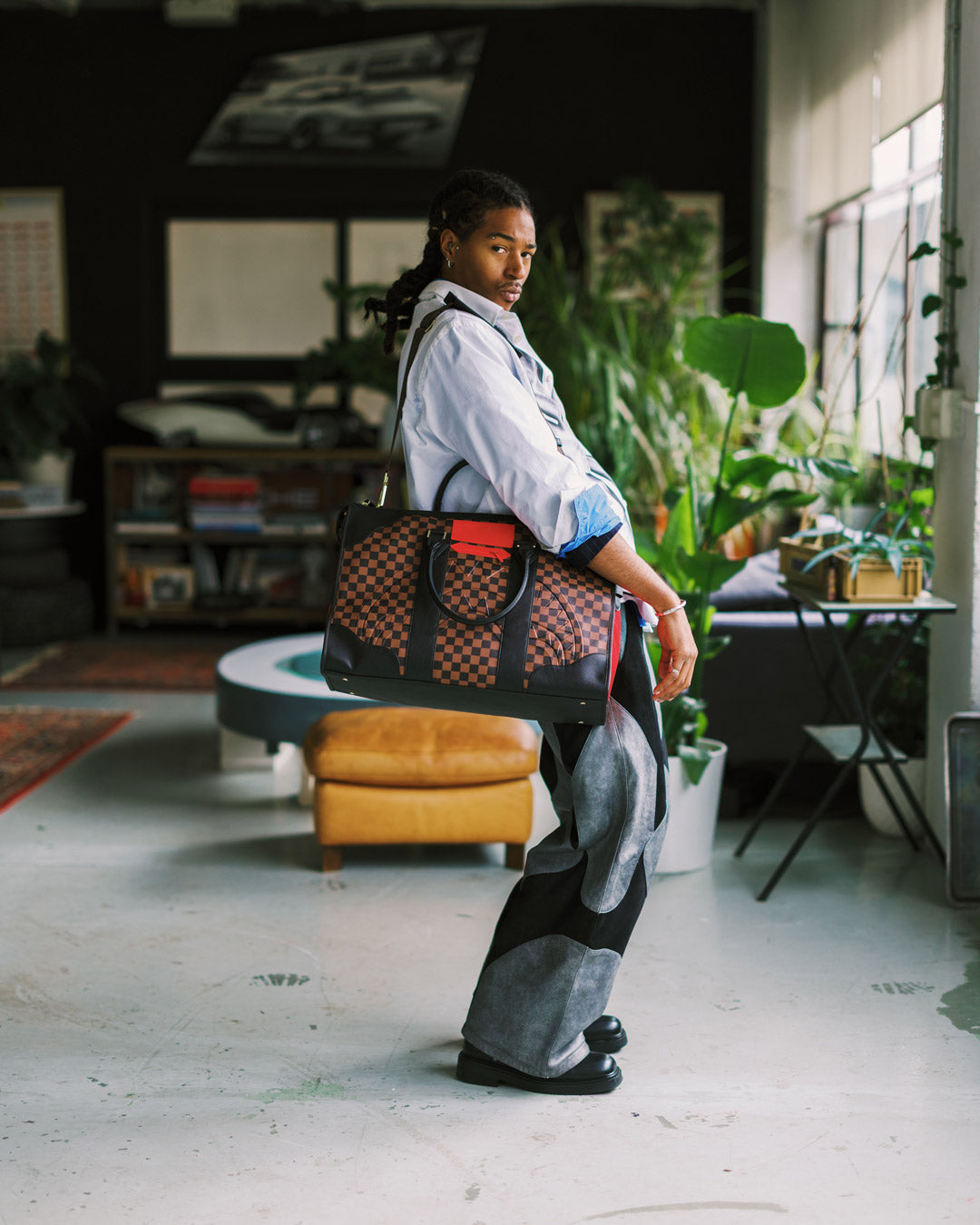 SPRAYGROUND® DUFFLE RED REDEMPTION PYRAMID DUFFLE