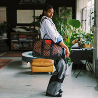 SPRAYGROUND® DUFFLE RED REDEMPTION PYRAMID DUFFLE