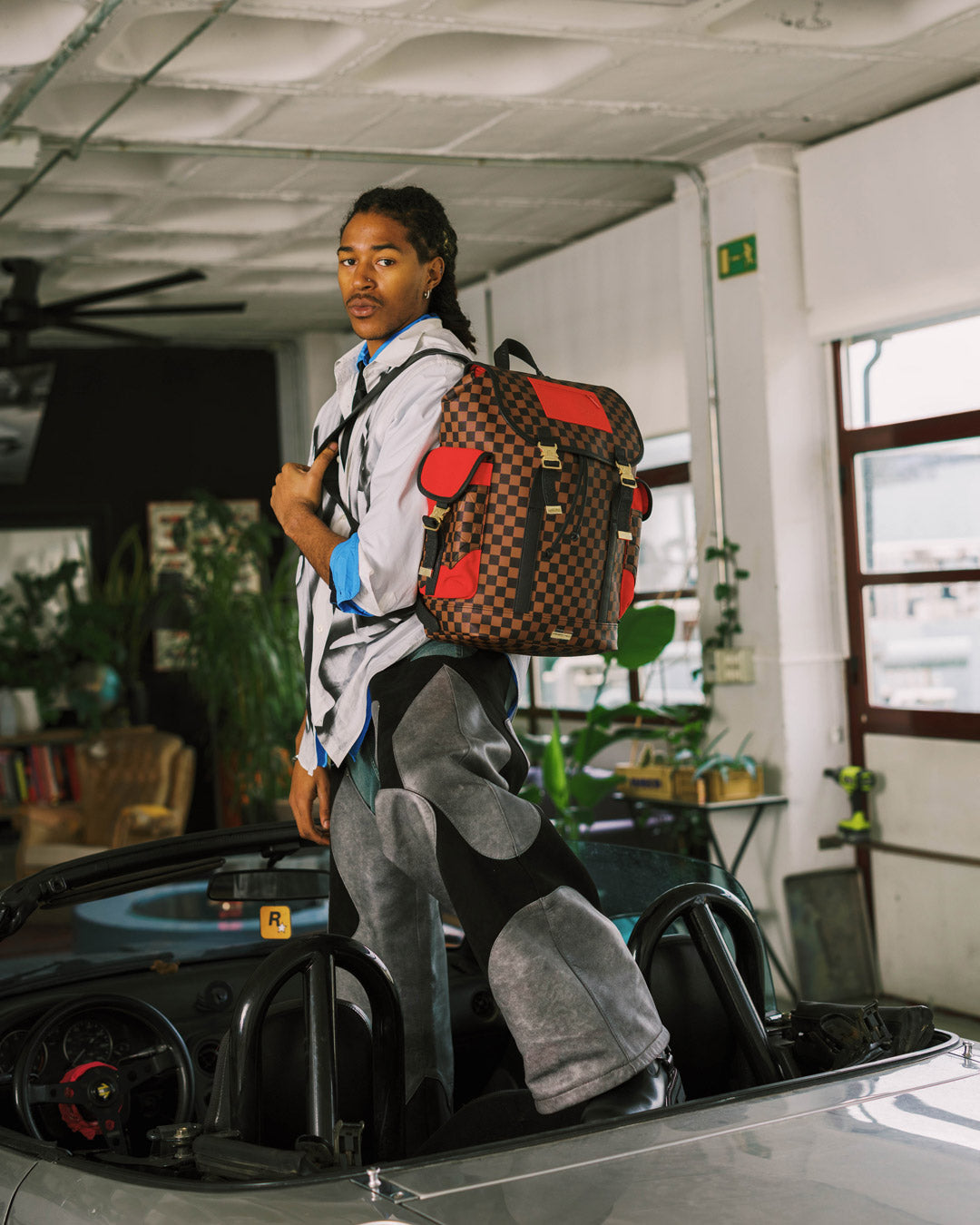 SPRAYGROUND® BACKPACK RED REDEMPTION MONTE CARLO BACKPACK