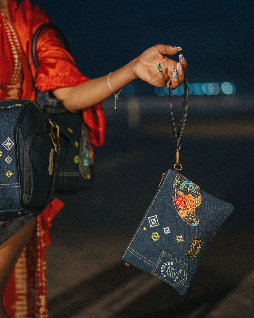 SPRAYGROUND® POUCHETTE EVISU STYLE CROSSOVER CLUTCH