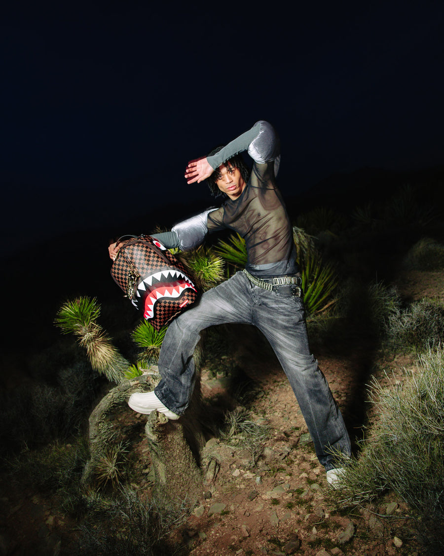 SPRAYGROUND® BACKPACK ASTROMANE AS THE WORLD'S LARGEST ZIPPER PULLEY