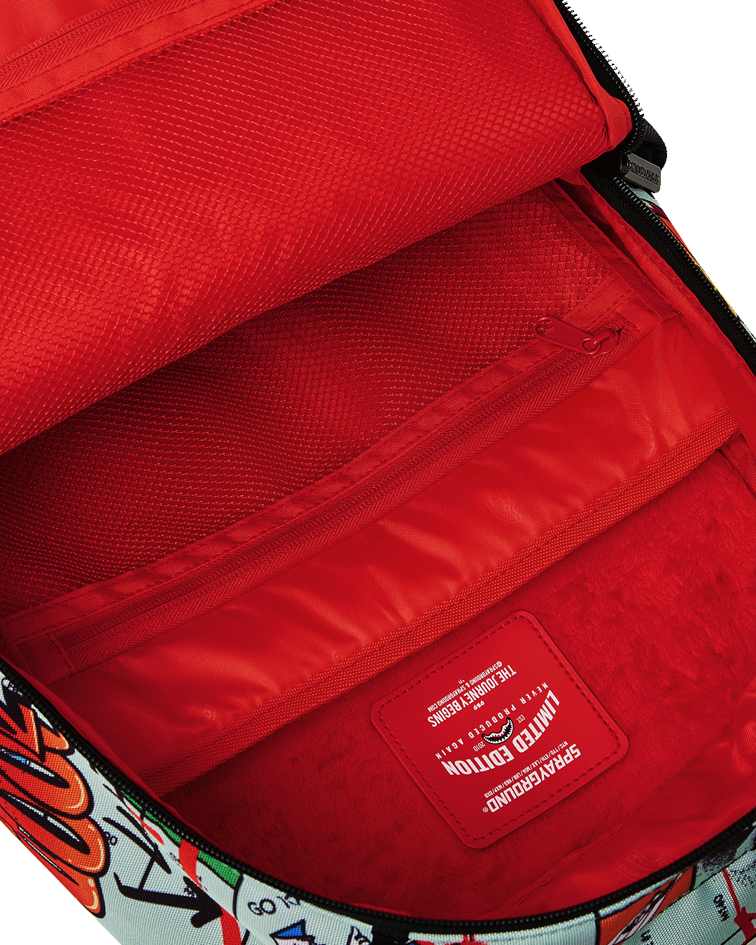 MONOPOLY DO NOT PASS GO DLXSR BACKPACK SPRAYGROUND
