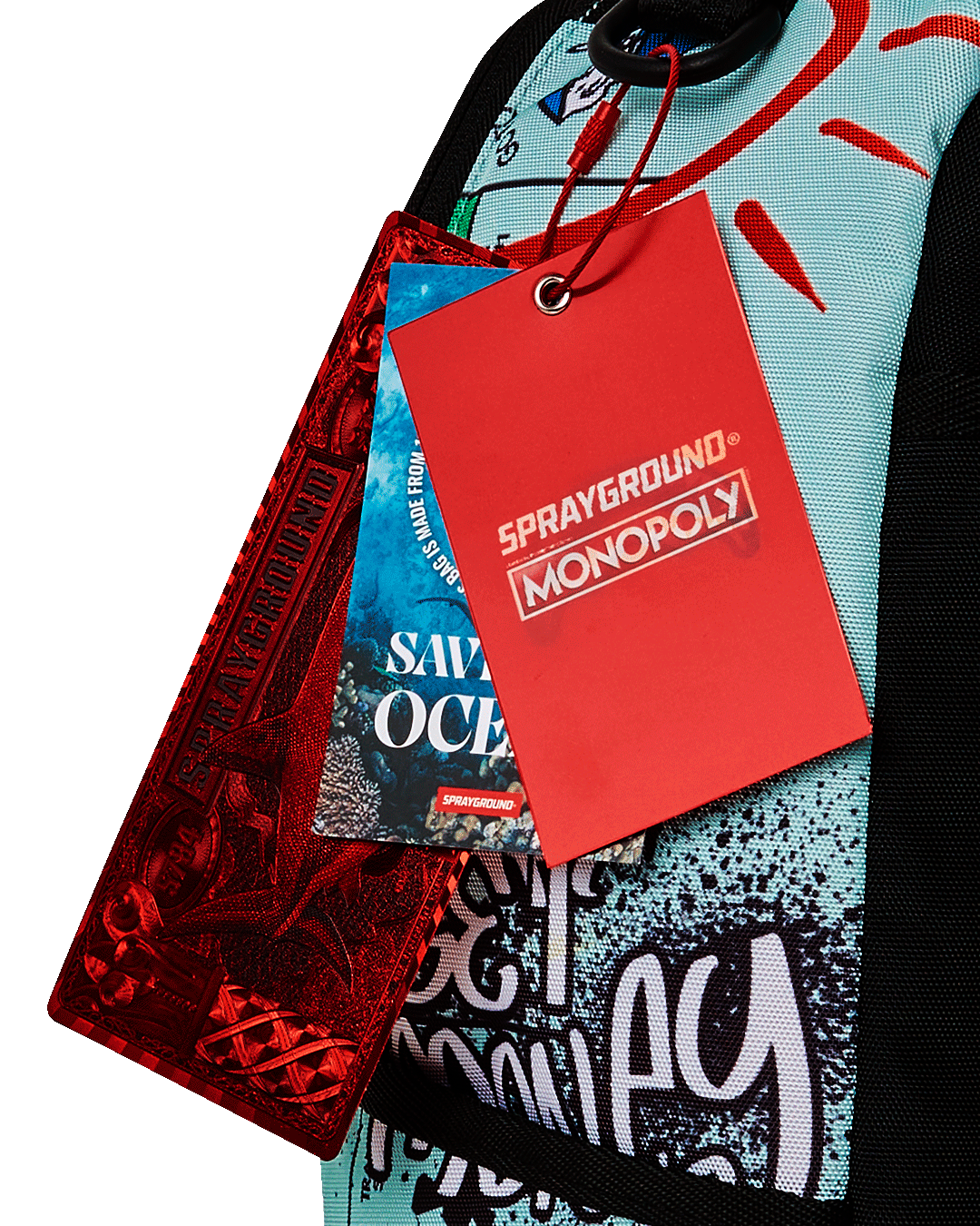 MONOPOLY DO NOT PASS GO DLXSR BACKPACK SPRAYGROUND