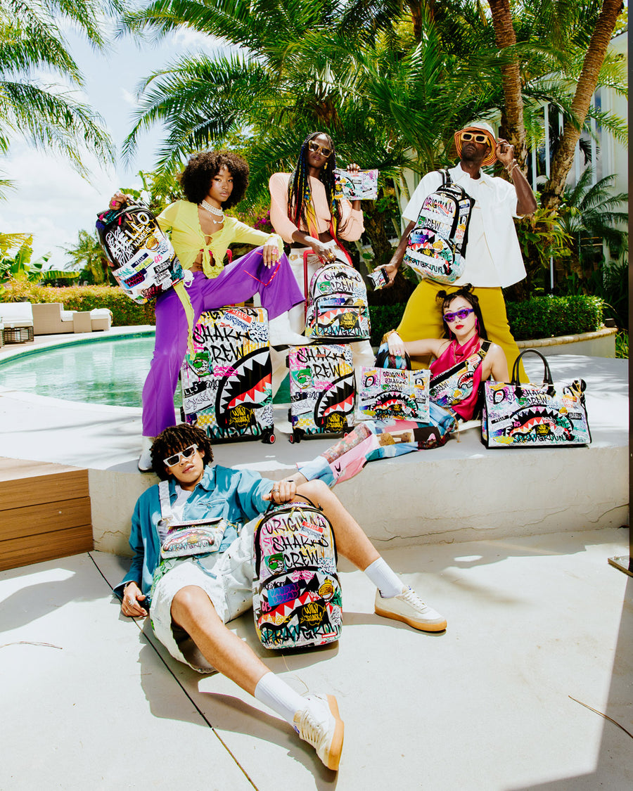 SPRAYGROUND® POUCHETTE CREATE ANOTHER DAY CROSSOVER CLUTCH W/ SHOULDER STRAP
