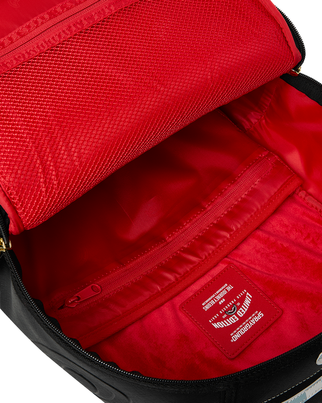 SPRAYGROUND® BACKPACK CREAM CHECK SIDE DRIP BACKPACK