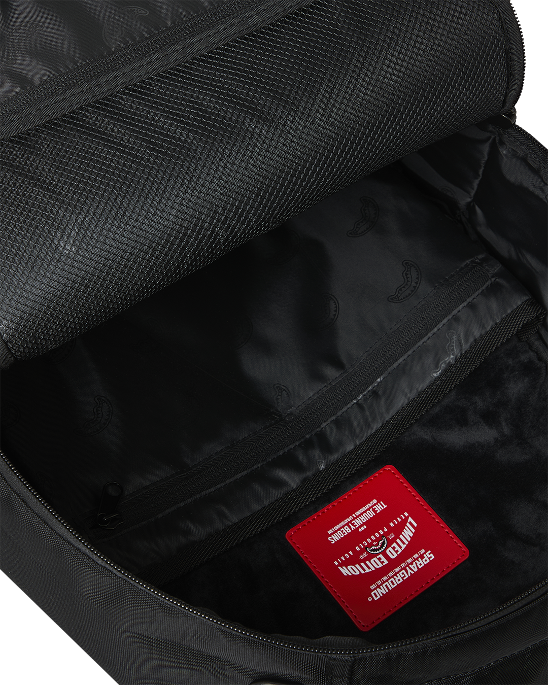 SPRAYGROUNDÂ® BACKPACK BLACKED OUT RUBBER PATCH BACKPACK