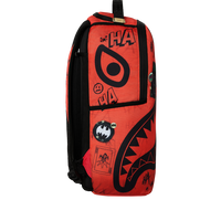 SPRAYGROUND® BACKPACK DC JOKER PRISON JUMPSUIT BACKPACK