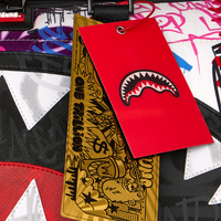 SPRAYGROUND® DUFFLE TAGGED UP PUFFER DUFFLE