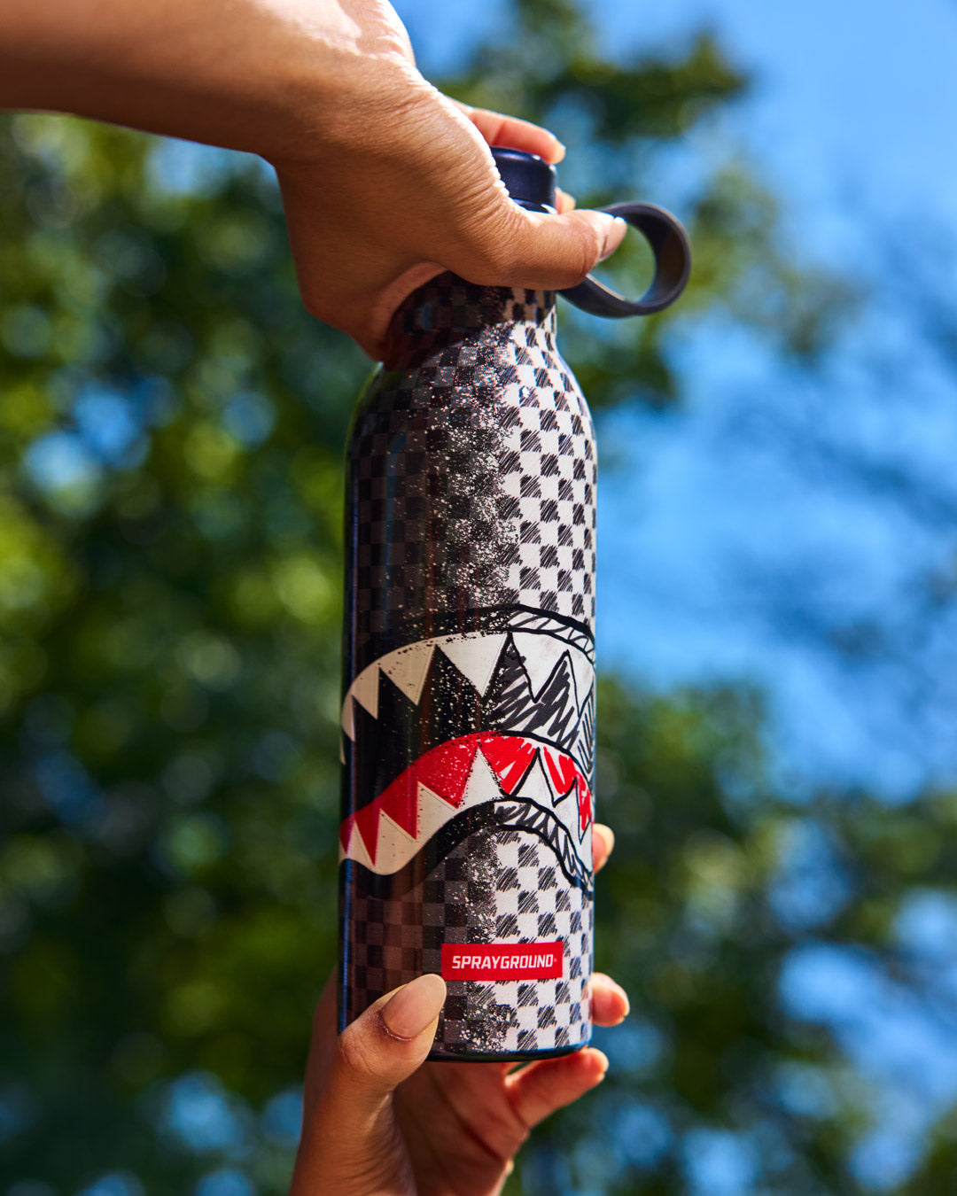 SPRAYGROUND® WATER BOTTLE DOODLE CHECK SPLIT WATER BOTTLE