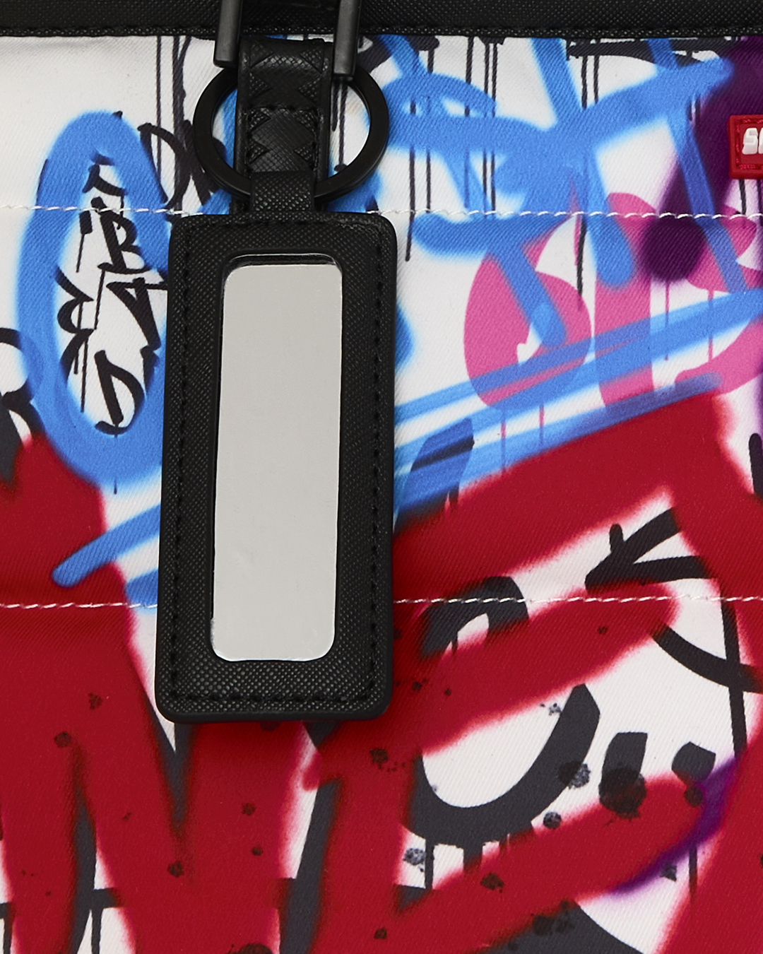 SPRAYGROUND® TOTE TAGGED UP PUFFER TOTE