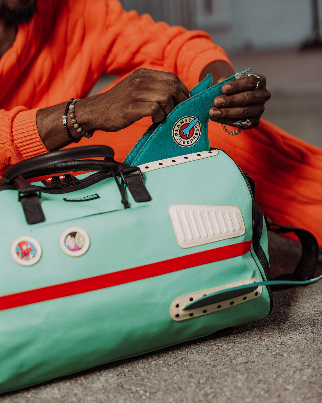 SPRAYGROUND® DUFFLE FUTURAMA PLANET EXPRESS PACK DUFFLE