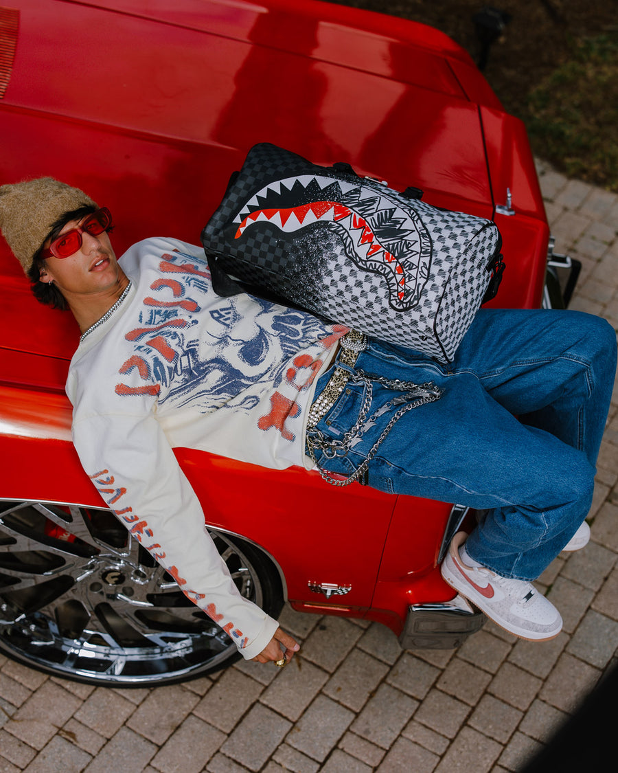 SPRAYGROUND® DUFFLE SCRIBBLE DRIBBLE CHECK DUFFLE