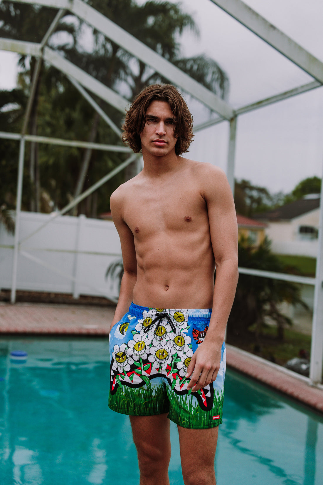 SPRAYGROUND® SWIM CRAZY DAISIES SWIM SHORTS