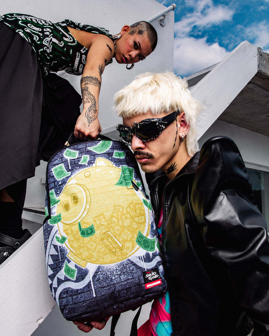 SPRAYGROUND® BACKPACK SQUID GAME PIGGY DLXR BACKPACK