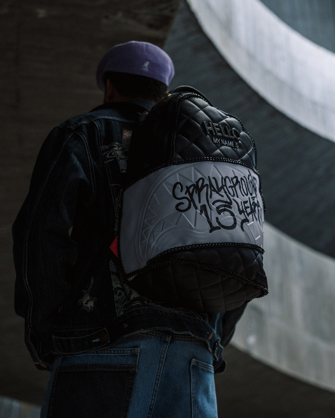 SPRAYGROUND® BACKPACK HELLO MY NAME IS 15 YEARS QUILTED BACKPACK