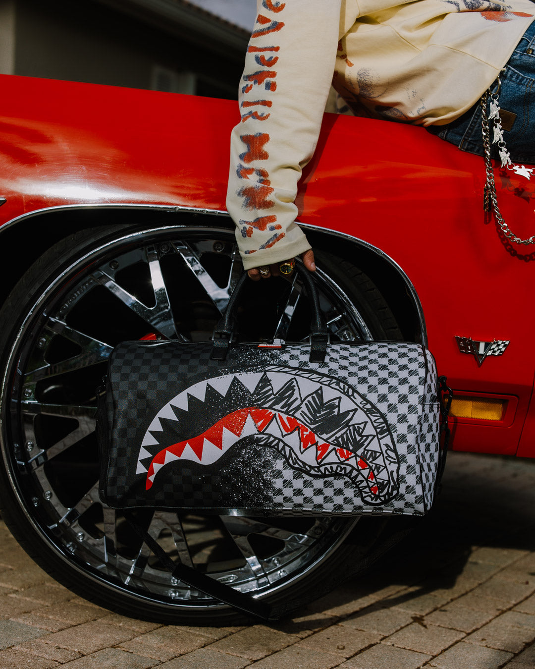 SPRAYGROUND® DUFFLE SCRIBBLE DRIBBLE CHECK DUFFLE
