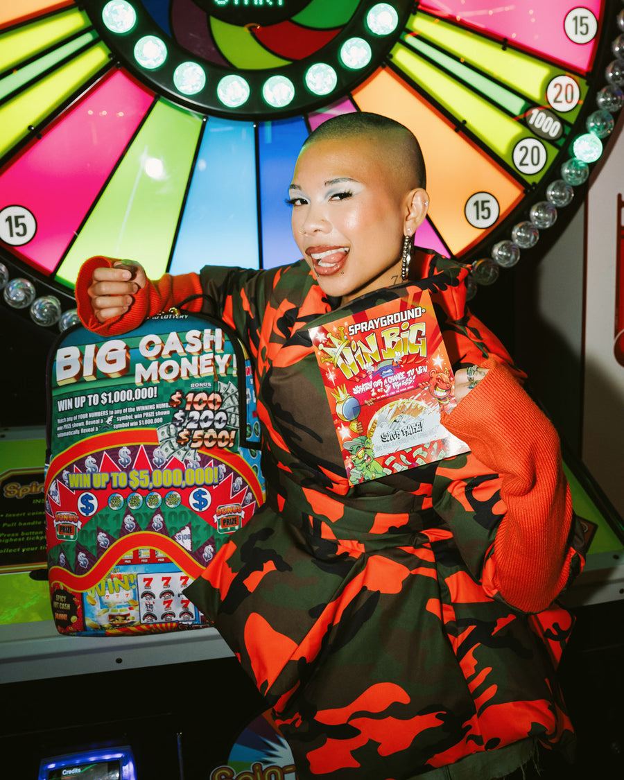 SPRAYGROUND® BACKPACK BIG MONEY BIG MONEY (WITH SCRATCH OFF PLAYING CARD) BACKPACK