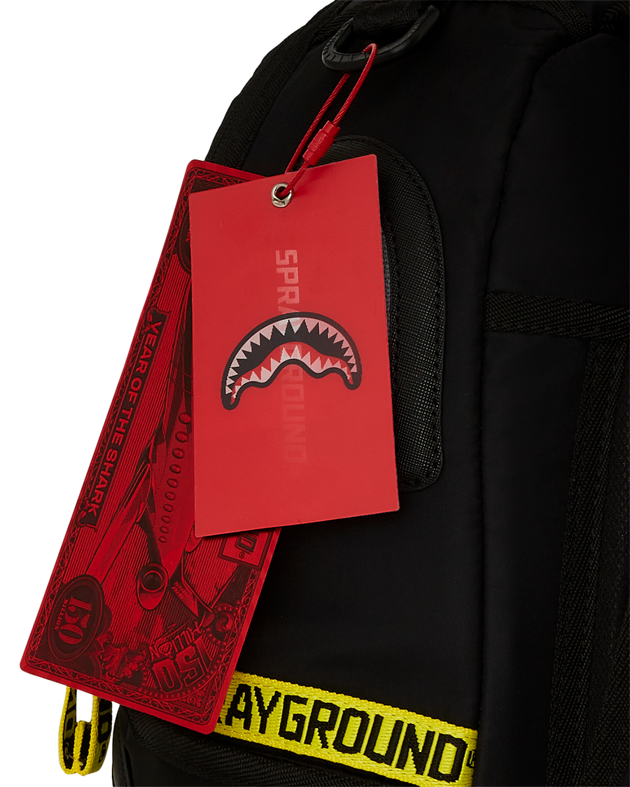 SPRAYGROUND® BACKPACK SHARK CENTRAL YELLOW TAPE DLX SATIN BACKPACK