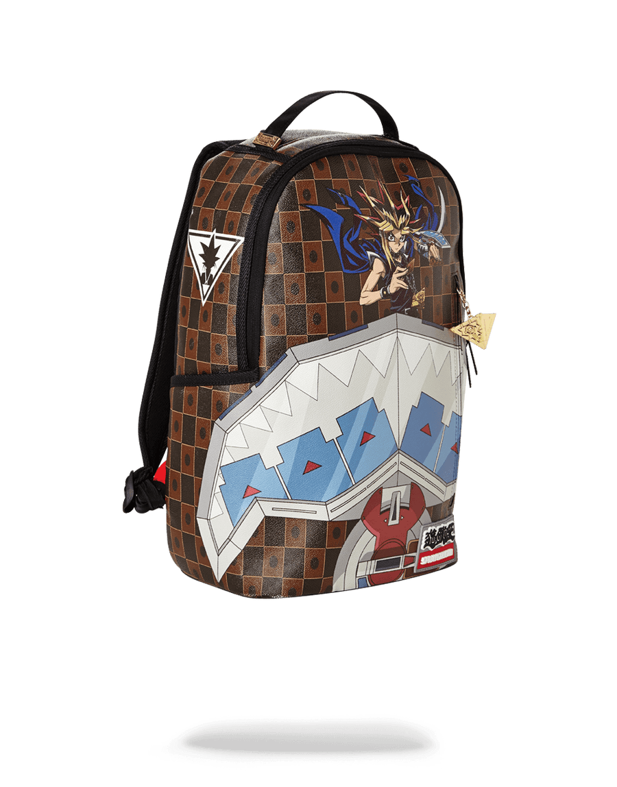 SPRAYGROUND® BACKPACK YU GI OH DUAL DISK SHARK