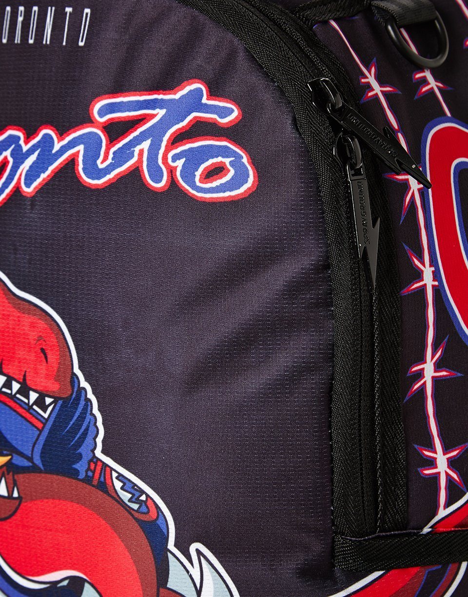 SPRAYGROUND® BACKPACK NBA LAB TORONTO RAPTORS DINOSUAR