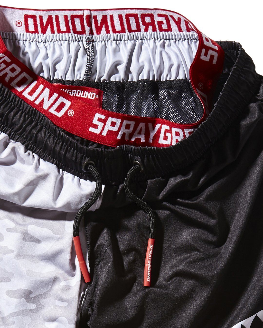 SPRAYGROUND® SWIM DAMAGE CONTROL CORTO SWIM TRUNKS