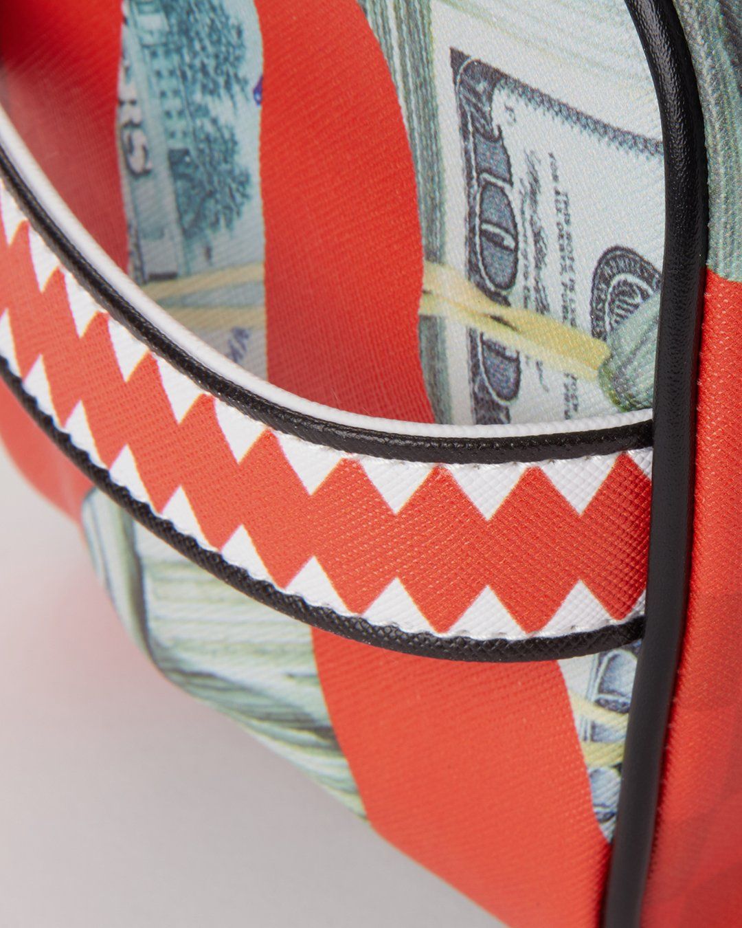 SPRAYGROUND® TOILETRY MONEY CAMO (RED) TOILETRY BAG