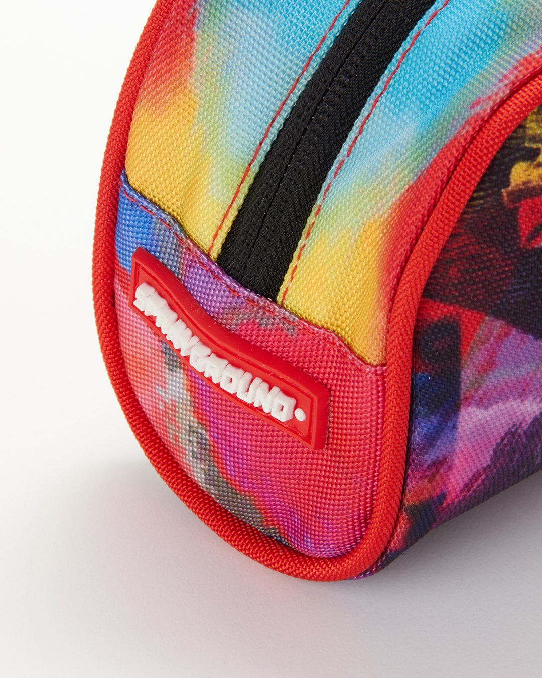 SPRAYGROUND® POUCH COLOR WAVE POUCH