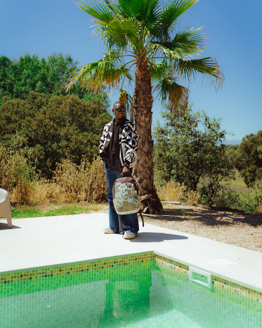 SPRAYGROUND® BACKPACK MONEY ON THE RUN BACKPACK (DLXV)